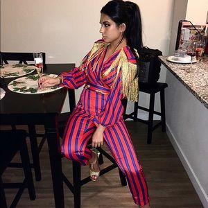 Jumpsuit, only worn once on New Year’s Eve.